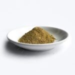 ground-black-pepper-ceramic-plate-isolated-white-background_422299-459